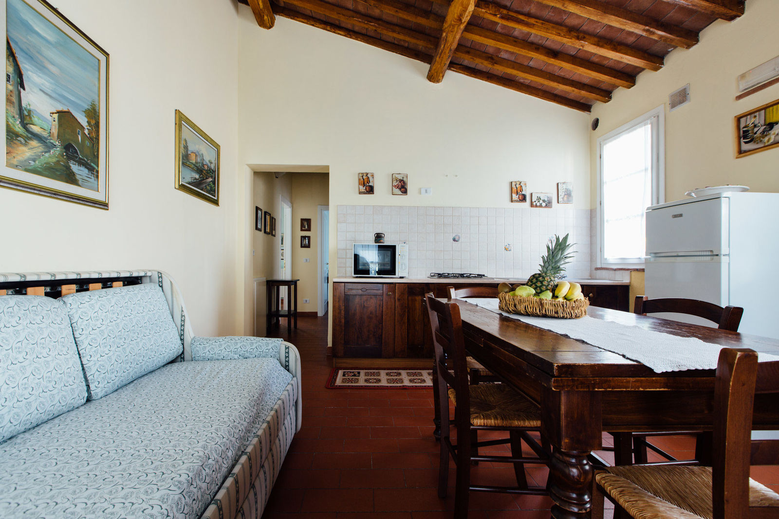 Trilocale con Veranda Privata e Vista Giardino